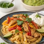 Chicken Fajita Pasta is a one-pot meal that combines the smoky, zesty flavors of fajitas with the creamy comfort of pasta. Packed with tender chicken, colorful peppers, and a cheesy sauce, it's a perfect dinner for busy weeknights!